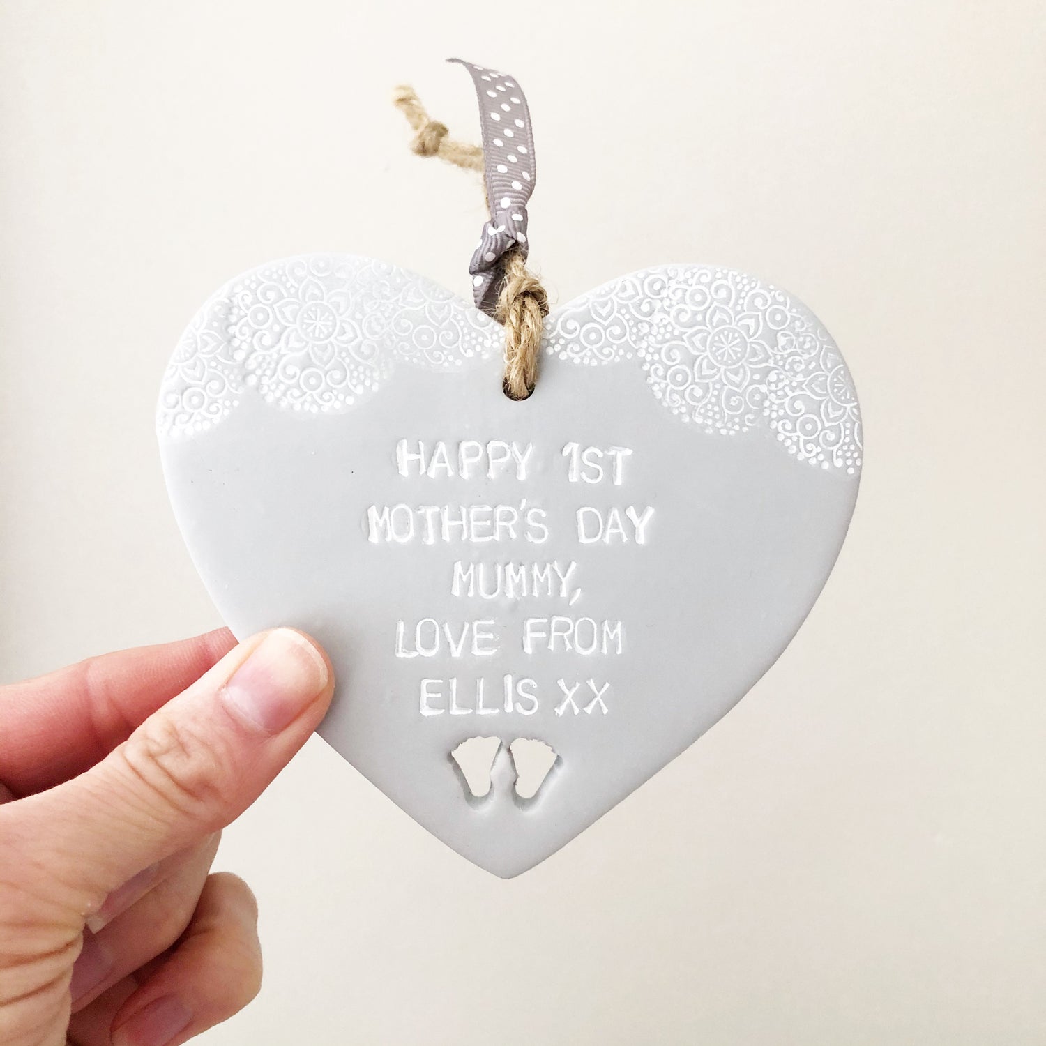 Personalised first Mother’s Day heart gift in grey clay personalised with Happy 1st Mother’s Day Mummy, love from Ellis xx with a white lace edge top