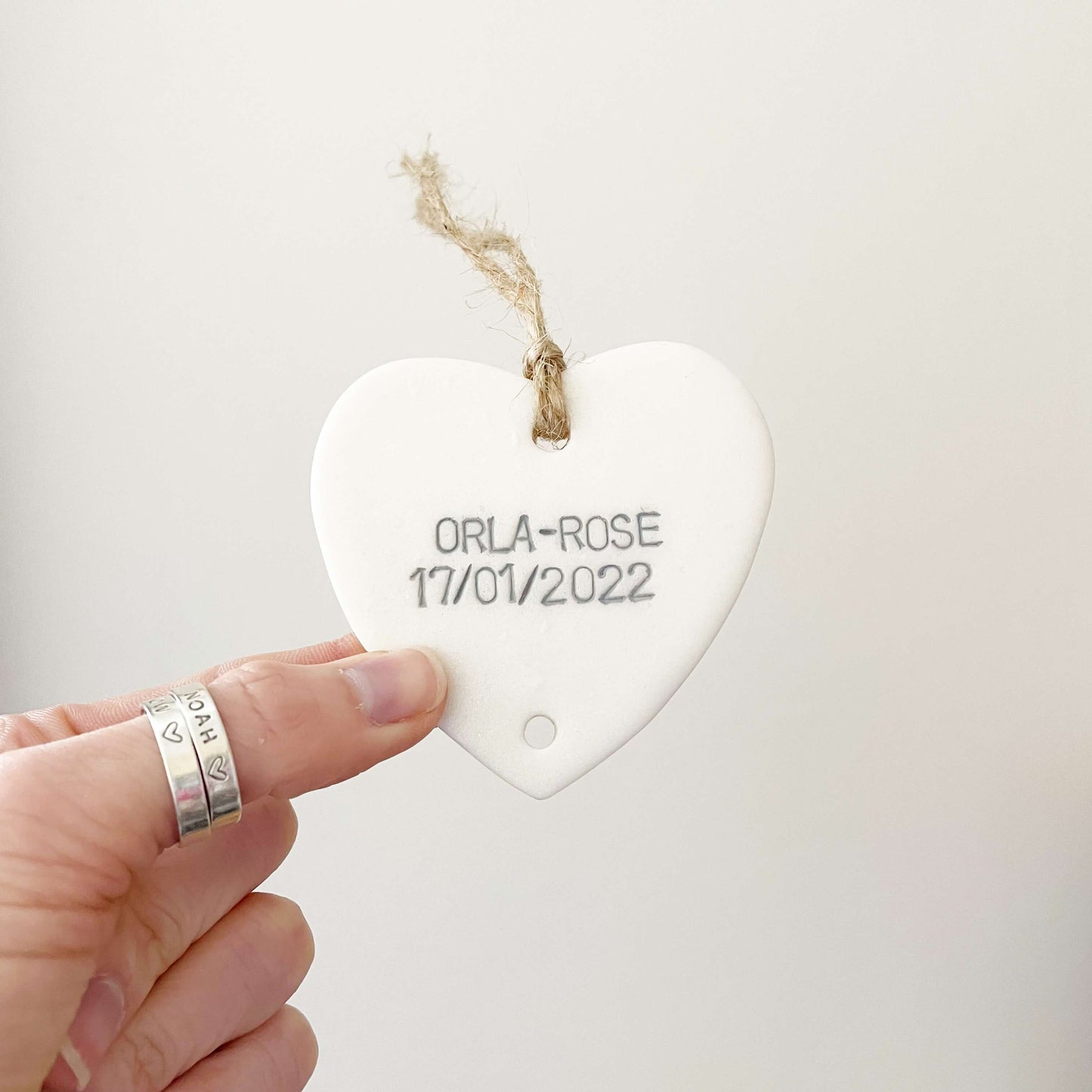 Small pearlised white polymer clay heart personalised with a name and date of birth, grandchild keepsake add on heart