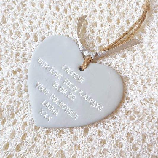 Personalised Christening baptism gift, grey clay hanging heart, the heart is personalised with FREDDIE WITH LOVE TODAY & ALWAYS 13.08.23 YOUR GODMOTHER LAURA XXX