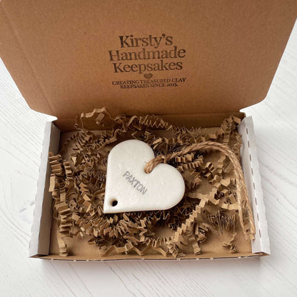 Small pearlised white polymer clay heart family tree add on personalised with Paxton in a white postal box with brown Kraft zigzag shredded paper