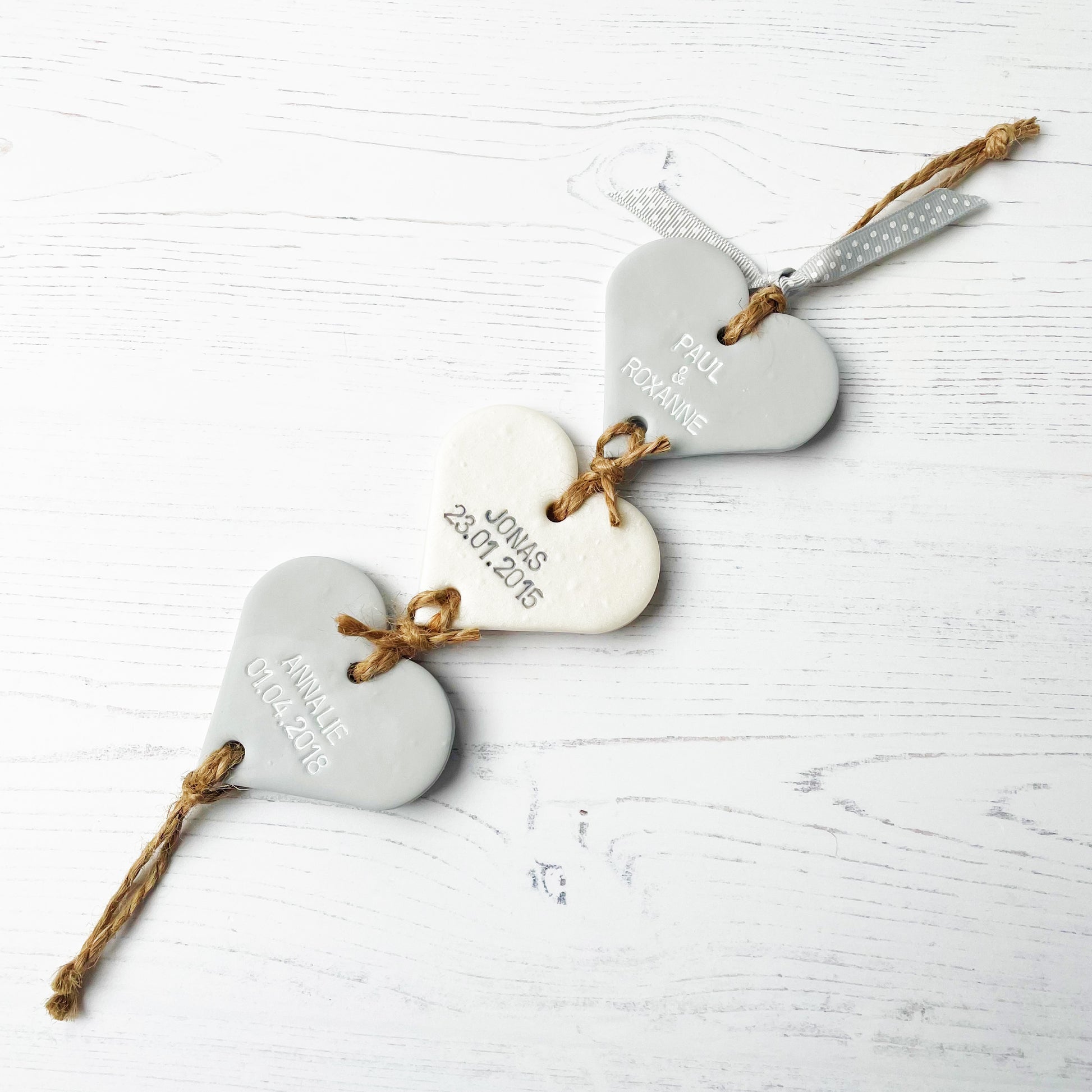 Personalised keepsake gift, hanging hearts engraved with family